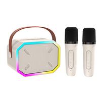 Mini BT Karaoke Machine Karaoke Speaker with Wireless Microphones Dazzling Color Light Effect for 2 mics balta