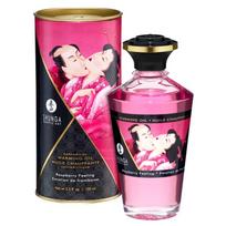Šildanti masažo aliejus su aviečių aromatu 100 ml Shunga