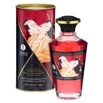 Šildanti masažo aliejus su braškių vyno aromatu 100 ml Shunga