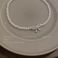 Elegant Pearl Bow Zircon Choker Necklace - Light Luxury Summer Clavicle Chain for Women