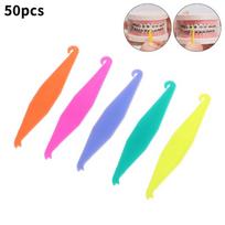 50 vnt. įvairių spalvų dantų ortodontiniai vienkartiniai elastiniai kabliukai, elastomeriai, fiksatoriai, dantų priežiūros priemonės 50Pcs
