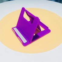 Mini Creative nešiojamas universalus sulankstomas plastikinis telefono laikiklis, planšetinio kompiuterio stovas 1PCS violetinė