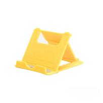 Mini Creative nešiojamas universalus sulankstomas plastikinis telefono laikiklis Nešiojamas planšetinio kompiuterio laikiklis Reguliuojamas lankstus sulankstomas „Lazy Desktop“ mobiliojo telefono stovo laikiklis geltona