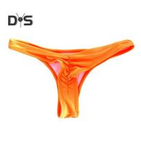 Moteriškos įžūlios bikini kelnaitės žemu liemeniu, stringai, rave kelnaitės, vidutinio kirpimo maudymosi kostiumėlio kelnaitės paplūdimiui, baseinui M oranžinė
