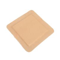 Kryžkaulio silikoninis tvarstis Kryžkaulio tvarstymo pagalvėlė Kraštuota lipni skirta pragulų skubiai priežiūrai Greita 12.5*12.5cm beige