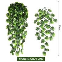 Dirbtiniai Monstery lapų vynmedžiai Žali kabantys augalai Girlianda sienų dekoravimui Namų sodo Vestuvių vakarėlio dekoracija Dirbtinio augalo vynmedis