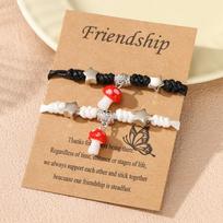 A pair of woven small mushroom couple bracelets, male and female student girlfriends, purely handmade jewelry. raudona
