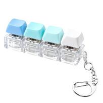 Klaviatūros Fidget žaislas 4-in-1 Klaviatūros dekompresijos mygtukas Pirštų spragsėjimo žaislas 4 klavišų Fidget raktų pakabukas Darbui Kelionėms Streso mažinimo stalo žaislas