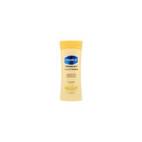 Vaseline Essential Healing Lotion - intensyviai drėkinantis kūno losjonas, 600 ml