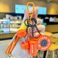 Cartoon Sports Fitness Barbell Plate Keychain: Cute Gift for Boys & Girls' Backpacks and Water Bottles (2025 Series) oranžinė