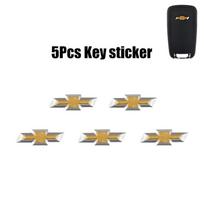 5 vnt. Automobilio nuotolinio rakto lipdukas Aliuminio emblemos dekoracija Lipdukas Chevrolet Cruze Spark Captiva Suburban Camaro Malibu Silverado