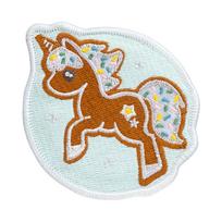 LAUT MAGMOJI BADGE – Unicorn Cookie Christmas Edition, PVC ir silikonas, ruda/šviesiai mėlyna, 1 vnt.