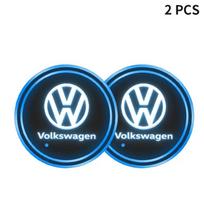 2x šviečiantys automobilio puodelių padėkliukų laikikliai su LED atmosferos šviesos logotipo lempa, skirta „Volkswagen“, „VW“, „Golf GTI“, „Tiguan“, „Jetta“ ir „Transporter Passat“.