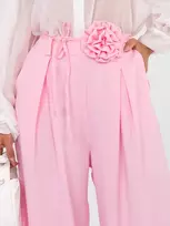 Moteriškos plačios kelnės šviesiai rožinės spalvos