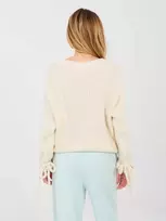 Moteriškas oversize megztinis šviesiai smėlio spalvos