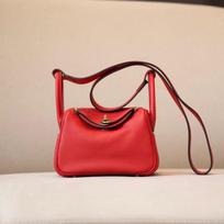 Lindi bag mini first layer togo cowhide leather single shoulder portable messenger women's bag doctor bag diagonal span bag elegant 19cm raudona