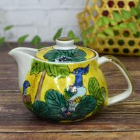 Stylish Kutani ware teapot by a ceramic made in with a tea Yoshidaya, brand, Japan, strainer.