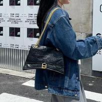 First layer cowhide women's bag 2025 new origami texture hand grab chain hourglass bag shoulder messenger bag Small size
