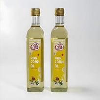 Popkorno aliejus iš kukurūzų, 2 buteliai po 500 ml, aukštoje temperatūroje kaitinamas aliejus su dideliu oleino rūgšties kiekiu ir sviesto aromatu, aliejus su sviesto aromatu, „Omega“ aliejus, skirtas kaitinimui aukštoje temperatūroje, popkorno aparatas,
