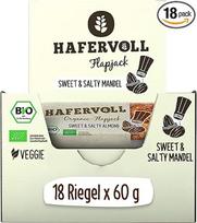„HAFERVOLL“ ekologiški „Flapjack“ saldžiai-sūrus migdolų skonio javainiai, 18 vnt. po 60 g – sertifikuoti ekologiški su medumi, be pridėto cukraus, iš avižų, kepti orkaitėje