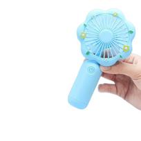 Flower Holds A Mini Fan. USB Charging Fan.