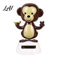Solar Powered Car Decoration Ornaments Shaking Head Monkey Toy Banana Holding Battery Free Toy Figure Dashboard Swinging Interior Figure balta