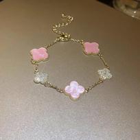 Four Leaf Clover Bracelet Adjustable Chain Link Bracelet with Flower Shape Elements and Textured Metal Accents for Everyday Wear One Size