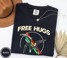 Free Hugs Arc Raiders Leaper T-Shirt | Leaper Sci-Fi Design, Funny Arc Raiders Shirt, Vintage Arc Raiders Inspired Parody Shirt, Gag Gift XL
