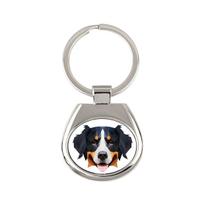 Bernese Mountain Dog, Berner Sennenhund - geometric keychain with a photo and the inscription Art-Dog balta