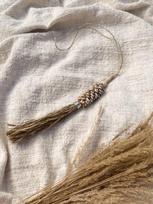 TIGA tassel