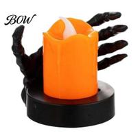Halloween Party Prop Candle Light, LED Skeleton Hand Decoration with Flickering Retro Light Flame, Spooky Tabletop Decor for Haunted House Horror A