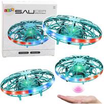 Žaislinis UFO dronas valdomas ranka, turkio spalvos