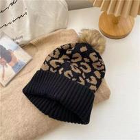 European and American fashion leopard print crimped hairball knitted hat women's hat outdoor warm thickened men's wool hat trend juoda