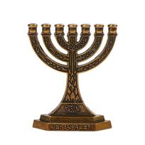 7 šakų žvakidės žydų menoros žvakidės relikvijos ornamentas auksas