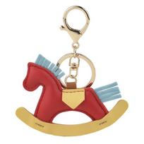 Children's Cartoon Rocking Horse Keychain - Handmade Wooden and Leather Pendant raudona