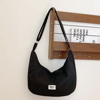 Solid color foreign style small fresh casual women's bag 2024 spring new shoulder messenger bag simple dumpling bag women's bag smėlis