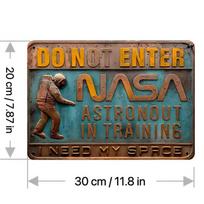 NASA Astronaut in Training 2D Embossed Effect Metal Tin Sign, Iron Wall Art Decor, Suitable for Home, Bedroom, Cafe, Bar, Office juoda