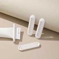 Dantų pastos išspaustukas, Dantų pastos spaustukas, Veido prausiklio Rankų kremo išspaustukas, Buitinis rankinis dantų pastos vyniojamasis išspaustukas 1PC white