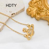 Fashion temperament model, planet inlaid zircon pendant necklace, 18k gold titanium steel light luxury collarbone chain necklace. auksas