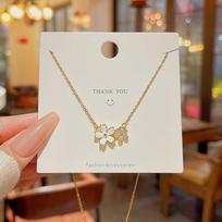 New cherry blossom necklace female Joker niche luxury studded clavicle chain small fresh fairy wind titanium jewelry. balta