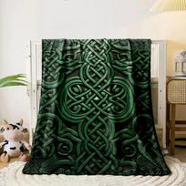 Intricate green Celtic knot design featuring interwoven loops and spirals. for all seasons blanket lunch break throw gift 80cm x 120cm