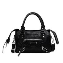 New oil wax leather handheld locomotive bag niche fashion rivet design texture messenger bag One Size