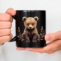 Ceramic mug with black bear cub and bay leaf design for coffee, tea and everyday use juoda