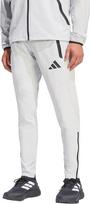 No Name Spodnie męskie adidas Tiro 26 Travel Woven jasnoszare KE8363 L
