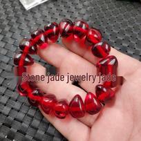 Irregular Shape Artificial Beeswax Bracelet, Imitation Blood Amber with Flower & Chicken Oil Yellow Accents brown