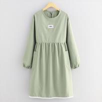 Fresh, stylish women's long-sleeved dress-style apron with splash-proof, stain-resistant protection for kitchen and home.