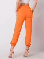 Oranžinės sportinės kelnės moterims