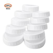 10 vnt. Balti Mason stiklainiai konservavimui, gėrimui Dangtelis 70 mm / 86 mm vidinio skersmens Plastikiniai dangteliai Be pamušalo Rumbuoti dangteliai Laikymo dangteliai Pakeitimai 86mm white