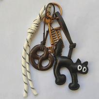 International Handcrafted Leather Bags, Ornaments, Keychains, Pretzel & Kitten Pendants, Accessories, and Cute Bag Charms. black