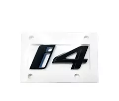 BMW i4 G26 bagažinės dangtis galinių durelių juodas užrašas Emblema originali 51145A63542